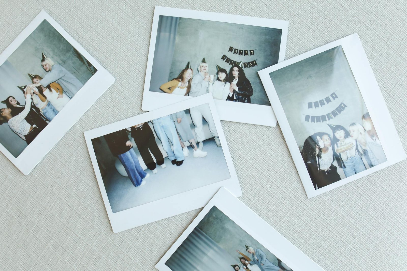 Polaroid snapshots capture friends celebrating a birthday with joy